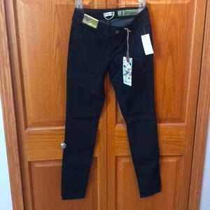 Indigo Rein skinny denim jean. Size 3. Stretchy with black rhinestones.